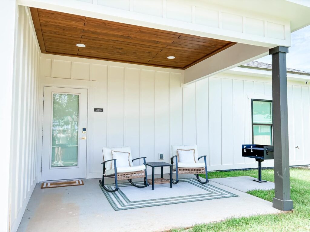 Back porch of cottage rental with grill space.
