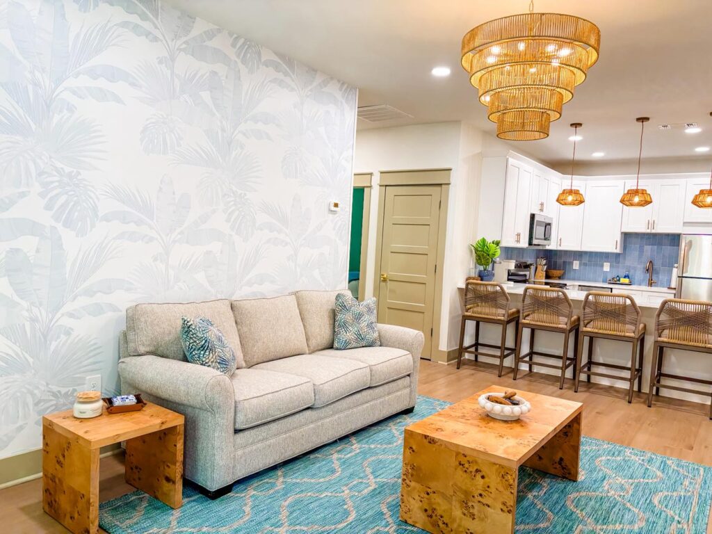 Spacious kitchen and living room in cottage rental at gulfport luxury rv resort.