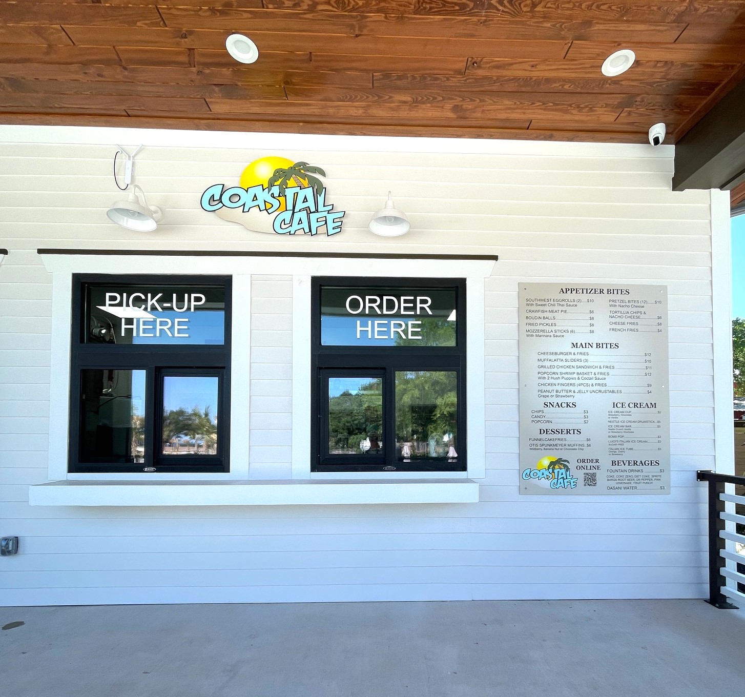Poolside Cafe Poolside cafe entrance with menu view.